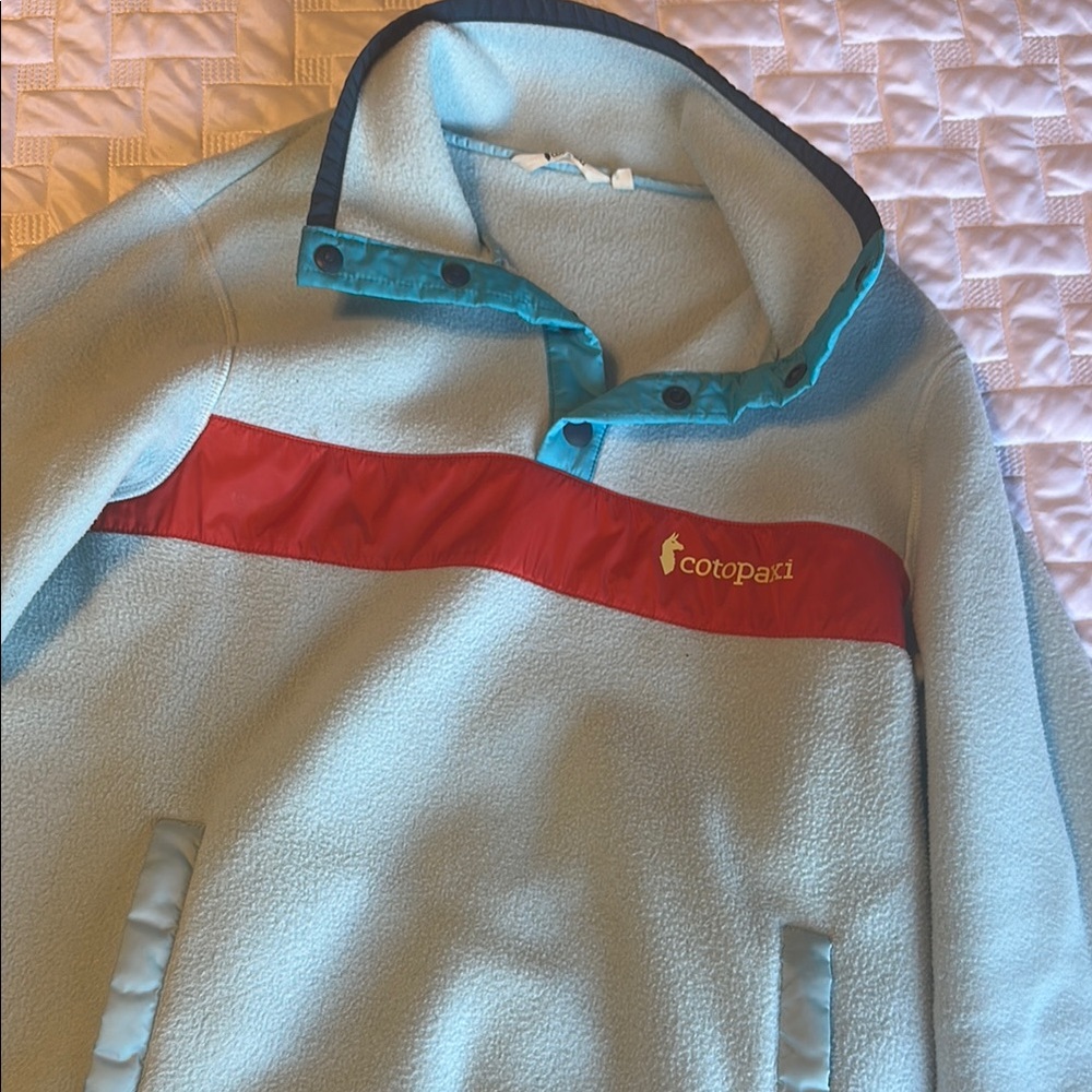 Cotopaxi Light Blue Fleece with Red and Teal Accents